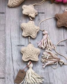 crocheted star ornaments with tassels and tags