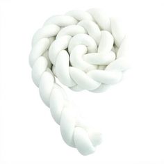 white beads are arranged in the shape of a spiral on a white background with space for text