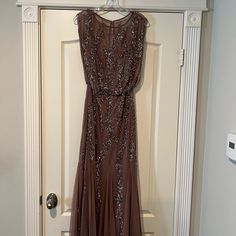 Women Party Dress New Brand:Aidan Mattox Size 8 Color : Sepia / Sequins New With Tag Brown Floor-length Maxi Dress For Evening, Sleeveless Evening Gown For Festive Occasions, Festive Formal Brown Dress, Sleeveless Festive Maxi Dress For Prom, Festive Sleeveless Maxi Dress For Prom, Sleeveless Brown Maxi Dress For Formal Occasions, Brown Sleeveless Maxi Dress For Formal Occasions, Champagne Sleeveless Gown For Party Season, Formal Sleeveless Brown Maxi Dress