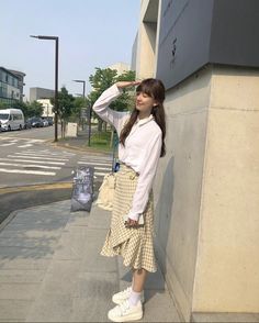 Shirt and long ruffle skirt outfit with oversized trainers Cr: @qurxoii Kim Ji-in Long Ruffle Skirt Outfit, Long Ruffle Skirt, Ruffle Skirt Outfit, Skirt Outfit, Plaid Skirt, Ruffle Skirt, Skirt Outfits, Midi Skirt