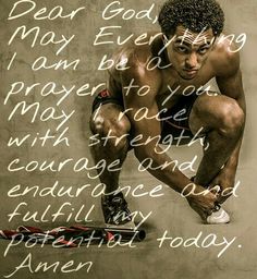 a man squatting down in front of a wall with words written all over it