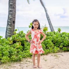 Sweet ruffly hem & comfortable sleeves delights this gorgeous playful floral dress -- making her feel like the Hawaiian princess she is. Round neckline Free form waist ties Ruffled sleeves A-line shape Back zipper Cotton Poplin Made in Hawaii, USA Size: 2 - 14 Cute Ruffle Hem Dress For Beach, Cute Ruffle Hem Dress For The Beach, Cute Ruffle Dress With Ruffle Hem For Beach, Playful Floral Print Dress With Ruffle Sleeves, Playful Ruffle Sleeve Dress With Floral Print, Playful Ruffle Sleeve Beach Dress, Pink Ruffle Sundress For Beach, Pink Ruffle Sundress For The Beach, Pink Ruffle Sundress For Vacation