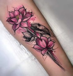 a woman's leg with pink flowers on it