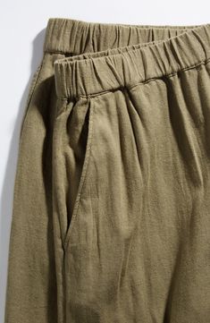 Cut from a breezy linen blend with a high waist and wide legs, these pull-on pants are a cool remake of a closet classic. 30" regular inseam; 25" leg opening; 11 12" front rise; 16" back rise (size Medium) 28" petite inseam; 24" leg opening; 11" front rise; 15" back rise (size Medium P) Elastic waist Front slant pockets; faux back welt pocket 55% linen, 45% rayon Machine wash, tumble dry Imported Women's Clothing Flax Wide-leg Pants With Pockets, Relaxed Fit Wide Leg Pants In Khaki, Relaxed Fit Flax Bottoms With Pockets, Khaki Tapered Leg Harem Pants For Summer, Linen Harem Pants With Pockets, Linen Wide-leg Harem Pants With Pockets, Green Linen Bottoms With Side Pockets, Green Linen Harem Pants With Elastic Waistband, Linen Wide Leg Bottoms With Pull-on Style