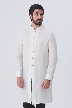 White linen kurta with front and cuff button placket
Components:1
Neckline:Mandarin
Sleeve Length:Full
Fabric:Linen
Color:White
Note: Pants worn by the model is not for sale - Aza Fashions Linen Kurta For Men, Kurta For Men, Kurta Men, Linen Color, Fashion App, Not For Sale, Indian Wear, Aza Fashion, Button Placket