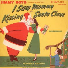 an old children's christmas book with santa claus kissing a child on the cheek