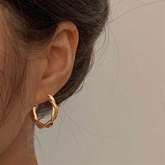 Gold or silver hoops with braided detail Measures 2.8 cm (1.1") in diameter Ear Hoops Gold, Earring Gold Hoop, Trendy Braided Jewelry, Golden Hoops Earrings, Good Hoop Earrings, Cute Hoop Earrings, Golden Earrings Aesthetic, Earrings Hoop, Gold Minimalist Plated Hoop Earrings