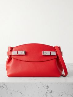 Ferragamo's shoulder bag is named after the way its 'Gancini' buckled tabs gently 'Hug' the sides. Made in Italy from red leather, it has an adjustable strap that detaches so you can carry it as a clutch. There's plenty of space inside to fit your keys, phone and cosmetics, plus internal slip pockets for your most-used cards. Matching Separates, Red Accessories, Eyewear Shop, Sport Swimwear, Boot Pumps, Knitwear Tops, Small Shoulder Bag, Beauty Accessories, Clothes Collection