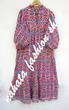 ITEM DESCRIPTION pink blue floral printed cotton long maxi dress - v neckline maxi dress - 34th sleeve with button maxi dress Features: 3/4th sleeve, V neck, Long dress Material: Cotton cambric Fabric: 100% cotton soft light weight ethnic print fabrics  Sleeve Length = 18 inch For more sizes & their measurement, please refer our below chart to understand the sizes variations available with us For your size requirement, please mention your size in seller note at the time of buying. SIZE MEASUREME Button Maxi Dress, Ethnic Print, Long Maxi, Long Maxi Dress, Dress Materials, Dress Clothes For Women, Pink Blue, Printed Cotton, Long Dress