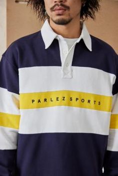 Rugby-style polo shirt by Parlez, complete with colour-block striping and an embroidered logo to front. Relaxed pullover style Ft. a polo collar, quarter button-up placket, drop shoulders, long sleeves and fitted trims. Content + Care 54% Organic cotton, 46% Recycled cotton Machine wash Size + Fit Model is 184.5cm/6'0" and wearing size Medium Diesel Shirts, Rugby Fashion, Blue Polo Shirts, Blue Polo, Polo Collar, Sneakers Men Fashion, Mens Polo Shirts