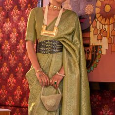 Olive Green colored saree is made from art silk fabric which is highlighted with beautiful floral weaving work as shown. comes along unstitched art silk blouse piece which you can customise as per your design/style. Occasion - You can wear this saree for festivals, parties, event and ideal for any fashionista. Note:- The actual product may differ slightly in color and design from the one illustrated in the images when compared with computer or mobile screen. Floral Weaving, Purple Weave, Handloom Weaving, Ruffle Saree, Woven Art, Saree Trends, Art Silk Sarees, Wear Saree, Blouse Material