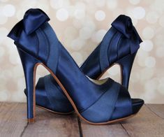 "Dress up your trip down the aisle with these 4\" navy blue wedding shoes.  Made-to-order for each bride, these platform peep toes feature a matching handmade satin bow on the back.   PLEASE NOTE:  We have received feedback that this shoe runs about a 1/2 to a full size small.  We recommend our Perfect Fit for this purchase.  You can read more about that here:  https://www.etsy.com/listing/179953704/the-perfect-fit-custom-wedding-shoe?ga_search_query=the+perfect+fit&ref=shop_items_search_1. Colo Blue Wedding Shoes Low Heel, Bow Wedding Shoes, Simple Wedding Shoes, Blush Wedding Shoes, Dream Wedding Shoes, Navy Blue Wedding Shoes, Navy Wedding Shoes, Converse Wedding Shoes, Wedding Shoes Sandals