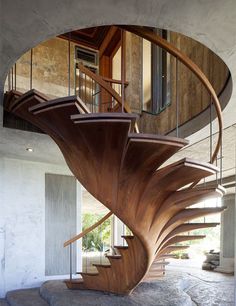 a spiral staircase in the middle of a room