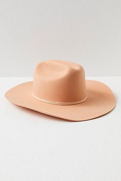 Taking cues from classic Western style, this vintage-inspired cowboy hat can instantly elevate any look. **Features:** Structured style, wool felt fabrication, dipped crown, wide upturned brim, rope accent **Why We | Ridge Felt Cowboy Hat by Lack of Color at Free People in Pink, Size: M Western Fur Felt Fedora For Spring, Western Style Fur Felt Fedora For Spring, Classic Spring Felt Hat For Rodeo, Western Style Fedora Felt Hat For Spring, Classic Felt Hat For Summer Rodeo, Fitted Felt Hat For Spring Rodeo, Classic Summer Felt Hat For Rodeo, Spring Felt Hat With Curved Brim For Western-themed Events, Spring Rodeo Fitted Felt Hat