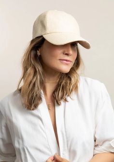 Make it a sporty summer in our classic paper woven Beach Cap! Great alternative to your cotton baseball caps. Adjustable sweatband for the perfect fit. Material: 100% Paper, Lining: 100% Cotton Measurements: Crown Height: 6 ¼”, Brim: 2 ¾” Sporty Summer, Classic Paper, Basic White Tee, Skirt Coverup, Beach Vacation Outfits, Something Navy, Chic Skirts, Slip Skirt, Woman Beach