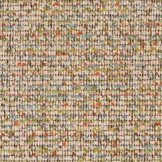 an upholstered fabric with multicolored dots and lines on the outside of it