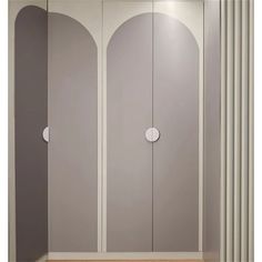 an empty room with two tall white doors