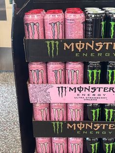 monster energy drinks are on display in a store