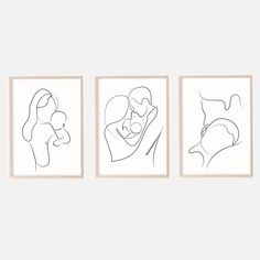 three framed art pieces with one line drawing of a woman holding a baby in her arms