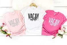 three t - shirts with the word barbie on them, one in pink and one in white