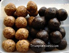 there are several different types of chocolates in the container on the table, including truffles