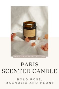 a candle with the words paris scented candle on it and an image of rose petals