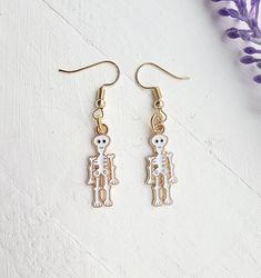 These super cute skeleton dangle earrings are a must have for the spooky season! Wear for Halloween or pair with a costume!  How to order Add to cart to purchase Handmade with love and care Cute Skeleton, Skeleton Earrings, Halloween Earrings, Halloween Jewelry, Girls Earrings, Handmade With Love, Cute Halloween, Spooky Season, Costume Jewelry