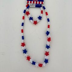 Red, White, And Blue Patriotic Theme Amscan Bracelet And Necklace Set For Kids. #Bracelet #Necklace #Jewelryset #Childrenjewelry #Patrioticjewelry 4th Of July White Beaded Bracelets Gift, White Beaded Bracelets For 4th Of July Gift, White Bracelets For Independence Day Gift, Patriotic White Jewelry For 4th Of July, Independence Day White Bracelets Gift, Red Plastic Bracelet Jewelry, Multicolor Beaded Bracelets For 4th Of July Gift, Red Patriotic Jewelry For Independence Day, White Bracelets For 4th Of July Gift