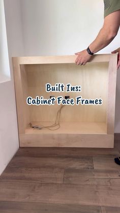 a man is holding a cabinet with the words built ins cabinet face frames