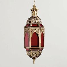 a red and gold lantern hanging from a chain