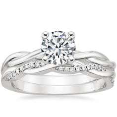 a white gold engagement ring set with diamonds