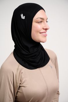 Created by us for us! A sports hijab that stays in place during your workouts while giving you a flattering look. This 2-piece sports hijab is lightweight and is easy to wear (no pins needed).The design is adjustable to suit your face, and makes you look good while exercising. It can be worn with or without the under cap and creates natural drapes. (Say goodbye to your old egg-shaped sports hijabs!) Fabric is breathable, sweat-wicking and cool. Extremely lightweight; can easily be tucked into your shirt. The design creates beautiful pleats. No more egg-shaped head! Stretchy fabric stays in place during high intensity workouts. Ethically made. FACE OPENING HEIGHT: S/M: 22cm (stretches to 26cm) L/XL: 24cm (stretches to 30cm) Lightweight Black Activewear For Gym, Fitted Lightweight Black Activewear, Lightweight Black Yoga Activewear, Black Lightweight Yoga Activewear, Lightweight Black Activewear For Yoga, Lightweight Breathable Black Activewear, Lightweight Black Activewear For Sports, Black Lightweight Activewear For Sports, Lightweight Moisture-wicking Black Activewear