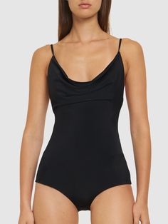 Fixed shoulder straps. Model is wearing a size36 One-piece Swimwear With Adjustable Straps And Stretch, Black One-shoulder Stretch Swimwear, One-shoulder Swimwear With Adjustable Straps, Adjustable Straps V-neck Swimwear For Pool, Nylon V-neck Bodysuit For Beachwear, Magda Butrym, Black Swimsuit, Flat Espadrilles, Swim Accessories