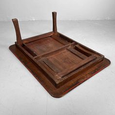 an old wooden tray with two handles