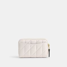 Crafted of quilted plush ultra-soft leather this case holds cards cash and other small essentials in a slim design that slips easily into pockets. Detailed with our Signature hardware the accordion gusseted design secures with a zip-around closure. | Coach Essential Small Zip Around Card Case With Pillow Quilting - Women's - Brass/chalk Elegant Quilted Rectangular Wallet, Luxury Coach Coin Purse With Card Slots, Classic Quilted Wallet For Everyday Use, Classic Quilted Wallet, Modern Coach Card Holder With Card Slots, Coach Wallets With Card Slots For Daily Use, Coach Wallets With Card Slots, Coach Wallets For Daily Use, Classic Quilted Rectangular Wallet