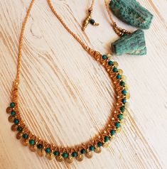 A charming and tribal Chrysacola and brass adjustable necklace, hand woven by me using the ancient technique of micro macramé. I make this neckalce to order from superior quality Italian waxed cord (water resistant, does not tear or fray), solid brass spiral charms, and Chrysacola beads Yours will be made especially for you so please allow me 5 days to weave it prior to shipping times. comes in a gift box Boho Statement Necklace, Micro Macramé, Micro Macrame, Necklace Boho, Choker Necklaces, Adjustable Necklace, Boho Necklace, Gold Plated Jewelry, Jewelry Plate