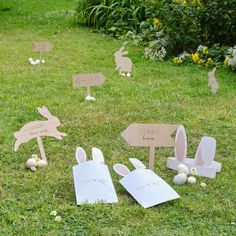 some bunny ears and signs in the grass