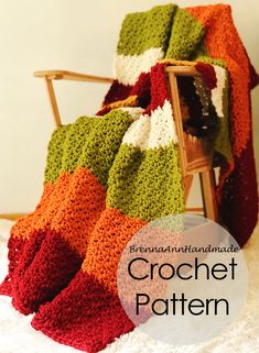 a crocheted blanket sitting on top of a wooden chair