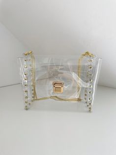 "Please note: We are safe and we fulfill the order as normal, in accordance with the declared deadlines. Clear deluxe bag, transparent glam handbag, vinyl clear bag, premium unique clear bag, transparent purse with chain, mass parties purse Dimensions: 21 x 18 x 11 cm /  8,26\" x 7,01\" x 4,33\" Made of thick, crystalline, flexible PVC, 100% vegan bag! You can use it for shoulder and crossbody. Medium transparent handbag with solid straps to my fascination with the universe transparent .You can complete your harmony as putting some compatible things with your daily dress into the transparent bag and you are ready to go! It's also good when going through airport security. This is no ordinary handbag :) Unconventional addition to the date, wedding, unusual styling to each highlighting your p Everyday Clear Plastic Bags, Everyday Use Clear Plastic Bags, Trendy Clear Plastic Shoulder Bag For Daily Use, White Clear Plastic Bag With Clear Strap, Trendy Clear Bag With Clear Strap, Trendy White Bag In Clear Plastic, Daily Use Clear Bag With Transparent Straps, Trendy White Clear Plastic Bag, Clear Plastic Shoulder Bag With Clear Strap