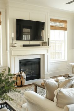 the living room is clean and ready to be used as a tv over the fireplace