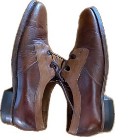 Brown Almond Toe Oxfords With Rubber Heel Cap, Brown Oxfords With Almond Toe And Rubber Heel Cap, Vintage Brown Boots For Formal Occasions, Vintage Wingtip Boots For Formal Occasions, Vintage Boots With Brogue Detailing And Almond Toe, Vintage Brown Boots With Rubber Heel Cap, Retro Brown Leather Oxfords, Retro Brown Lace-up Oxfords, Retro Brown Boots With Leather Sole