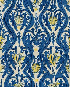 an intricately designed wallpaper with blue and yellow designs on the outside of it