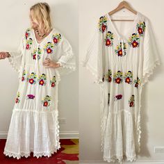 Vintage 60s Mexican hand embroidered kaftan, Great as beach cover up  or summer dress  Size: free See phtos for Measurements  Tag: none Condition: perfect vintage condition Floral Embroidered V-neck Dress For Beach, Spring Embroidered Beachwear Maxi Dress, Bohemian Embroidered V-neck Summer Dress, Summer V-neck Embroidered Kaftan, Summer V-neck Kaftan With Floral Embroidery, Floral Embroidery Beachwear Dress For Festival, Traditional Floral Embroidered Dress For Vacation, Bohemian Embroidered Beach Dress For Summer, Summer Embroidered Beachwear Maxi Dress