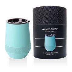 a blue tumbler next to a black box