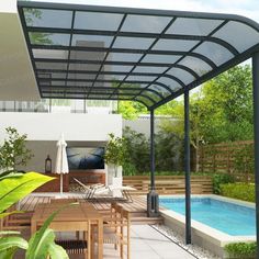 an outdoor covered patio area next to a swimming pool