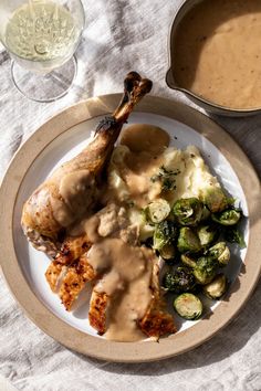 roasted turkey topped with white wine gravy thanksgiving dinner plate White Wine Gravy, Kosher Rules, Turkey Pan, Wine Gravy, Roasted Shallots, Turkey Broth, Cheese Pumpkin, Sprouts With Bacon, Fall Dishes