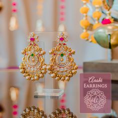 When design and imagination come together, the result is pure magic! Accessorize your look with this exquisite pair of earrings crafted with stones and pearl beads. Approximate earrings length is 3". Gold-plated on high-quality brass as base metal. In-stock & ready-to-ship. *Please Note: We use faux stones and beads in all of our jewelry. Gold Jhumka Earrings, Beautiful Gold Necklaces, Gold Jewelry Simple Necklace, Gold Mangalsutra Designs, Gold Necklace Indian Bridal Jewelry, Gold Bridal Earrings, Indian Jewellery Design Earrings, Gold Pendant Jewelry, Gold Bride Jewelry