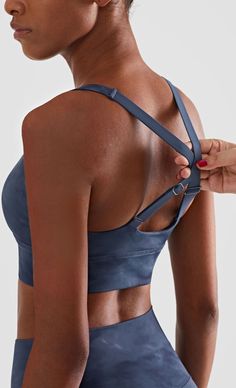 The EMES SHOP sports bra details a soft buttery touch that exemplifies comfort in sportswear. Featuring a criss cross design on the back. this athletic wear will be your go-to for each workout session.MATERIAL: 75% Nylon. 25% Spandex MEASUREMENTS: Small | Bust: 34" in . Band: 30" in . Length: 30" in Medium | Bust: 36.5" in . Band: 32.5" in . Length: 31" in Large | Bust: 39" in . Band: 35" in . Length: 32" in MEASUREMENTS: Small | Bust: 86.4" cm . Band: 76.2" cm . Length: 76.2" cm Medium | Bust: Bra Friendly Crisscross Activewear For Yoga, Athleisure Sports Bra With Crisscross Straps For Workout, Athleisure Crisscross Sports Bra For Yoga, Sporty Activewear With Light Support And Crisscross Design, Sporty Crisscross Activewear With Light Support, Solid Cross Back Sports Bra For Workout, Athleisure Sports Bra With Light Support And Crisscross Back, Cross Back Sports Bra For Workout, Athleisure Sports Bra With Crisscross Straps For Yoga