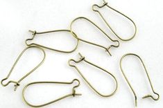 This listing for 100 pcs Antique Bronze Kidney Ear wires Size: 24 mm long x 11 mm wide Material : Alloy Please contact me if you would like more quantity.. Thank you for looking Bronze Earrings, Earring Wires, Antique Earrings, Polymer Clay Beads, Ear Hook, Brass Earrings, Hook Earrings, Diy Jewelry Making, Ear Wire