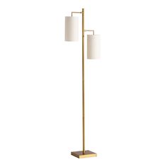 a floor lamp with two lamps on each side and one light on the opposite side